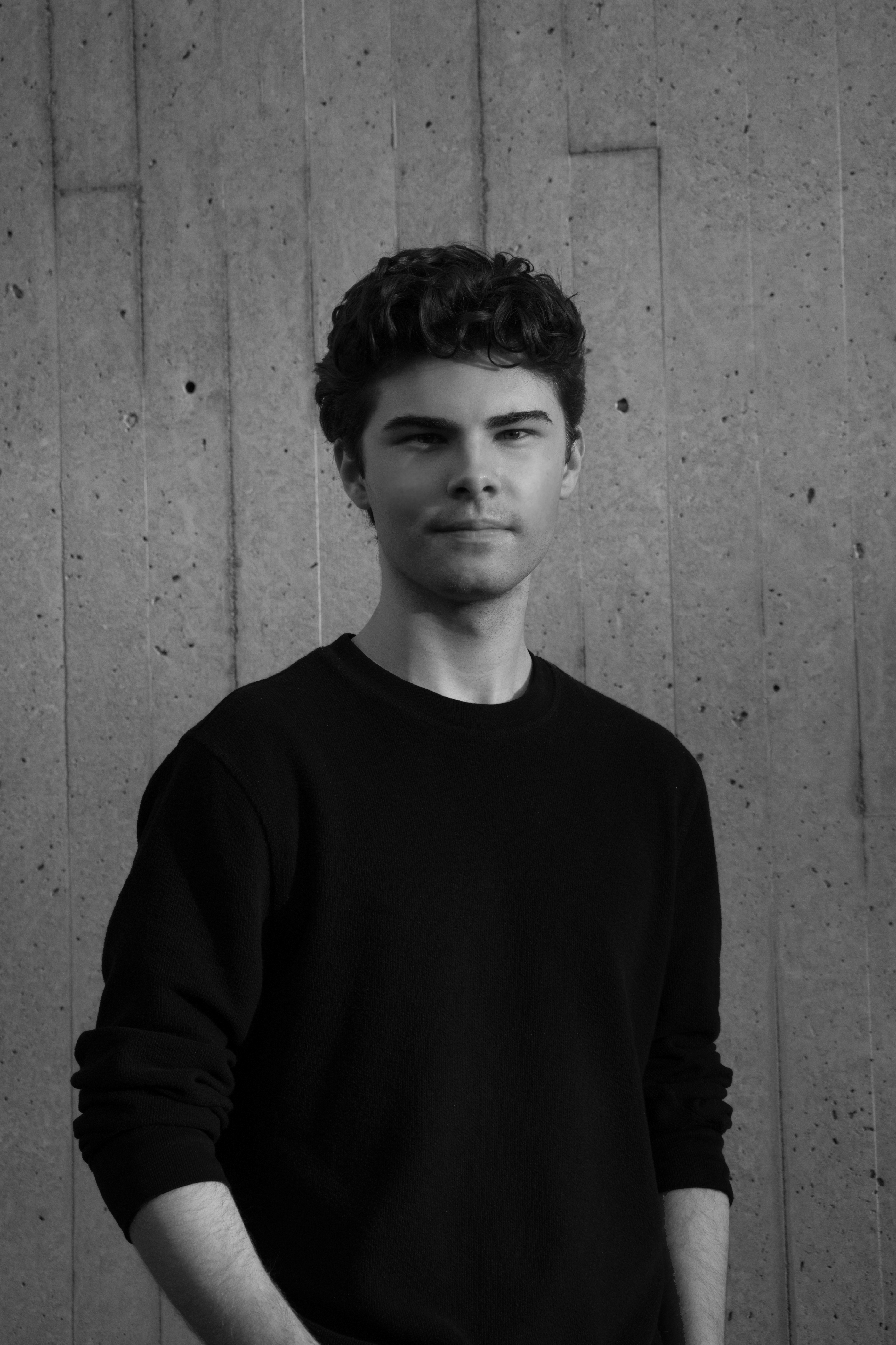 Black-and-white portrait of Andrew Wheat