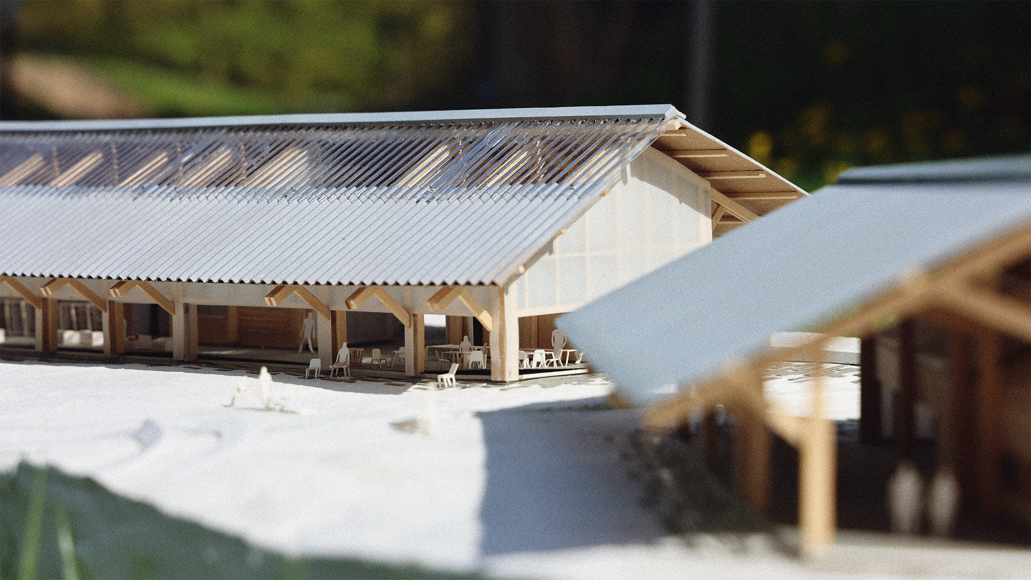 Close-up of the Enfield Food Pantry physical model with a corrugated roof